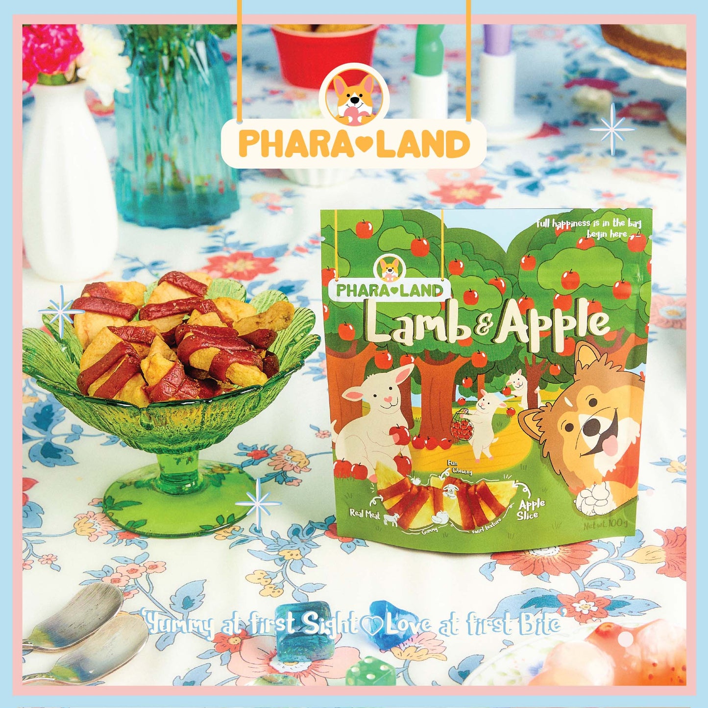 PharaLand Lamb & Apple Treats in a green bowl, showing tender lamb wrapped around apple slices. Healthy pet snack.