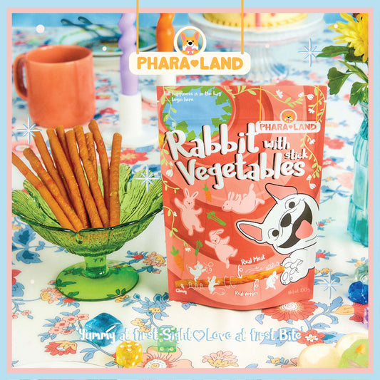 PharaLand Rabbit with Vegetable Stick pet treats in a green bowl. Chewy, novel protein snacks for dogs and cats.